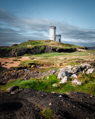 Fototapeta na wymiar The Elie Ness lighthouse on the outskirts of the town of Elie in the East Neuk of Fife
