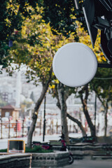 white blank circle signboard on street