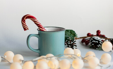 Items of New Year's decor on a light table. Festive concept. Gifts for Christmas and New Year.