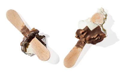 Eaten chocolate ice cream on a stick on white background - 714346535