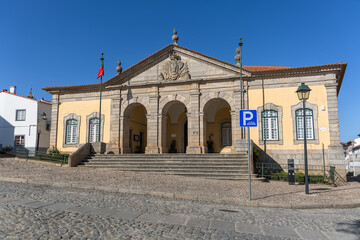 Fototapeta na wymiar Exterior view at the Almeida municipal council facade building or Camara Municipal de Almeida, on Liberdade square, on Almeida city, Portugal