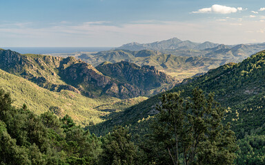 Fototapeta premium Panoramic view of inner Sardinia in the area of Supramonte of Baunei seen from the SS125 motorway