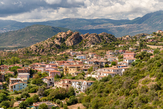 Panoramic summer view Santa Maria Navarrese, small touristic town in east Sardinia, with inner hills in the background