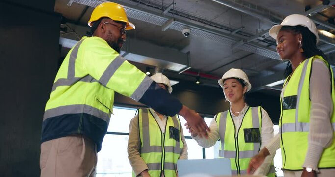 Construction worker group, handshake and agreement for people, welcome or introduction for onboarding. Man, women and engineering team with shaking hands, deal and respect for architecture company