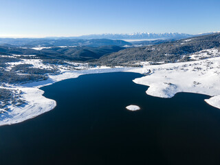 Aerial winter view of Belmeken Dam at Rila mountain, Bulgaria