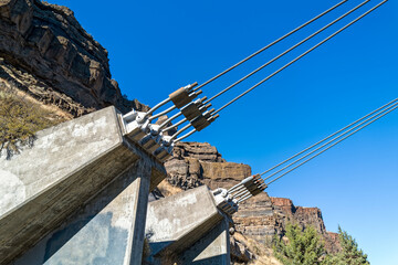 Concrete anchors for the cables supporting the bridge over the Deschutes River at Cove Palisades State Park, Oregon, USA