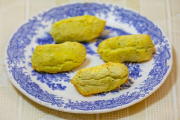 Traditional Portuguese cod dumplings served with olive oil