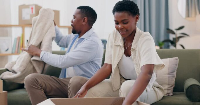 African couple, boxes and moving with packaging, home living room or ready for fresh start with property. Black woman, man and cardboard container for pillow, new house or helping hand on lounge sofa