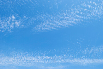 air clouds in the soft blue sky