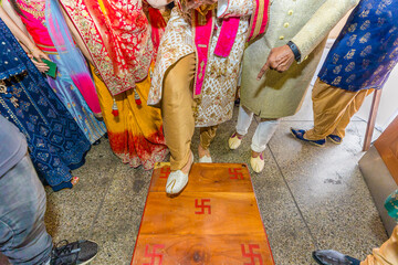 Indian Hindu wedding ceremony ritual items feet close up