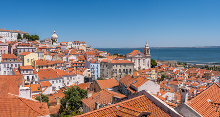 Fototapeta na wymiar Beautiful views from Portas do Sol Viewpoint in Lisbon's old city.