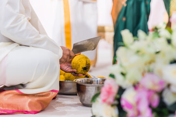 Obraz na płótnie Canvas Indian Hindu wedding ceremony ritual items hands close up