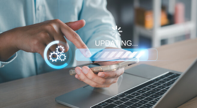 Software update or operating system upgrade concept. Man working and install software data update process in computer. Software new versions improved efficiency and security. Internet system upgrade