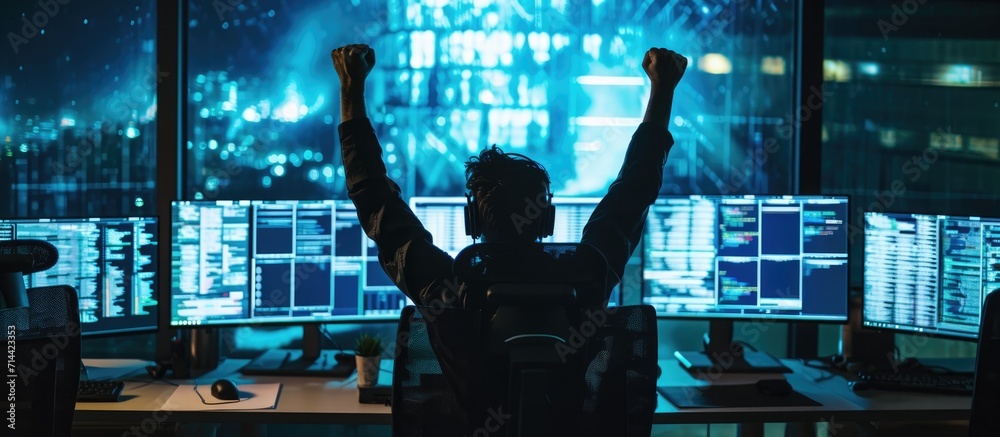 Canvas Prints Late at night, an unidentified hacker is happily celebrating their successful theft of passwords in an office filled with multiple monitors.