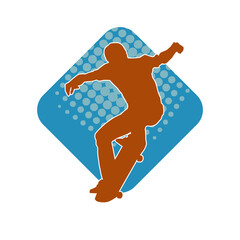 Silhouette of a male in action pose on skateboard. Silhouette of an urban boy on skateboard.