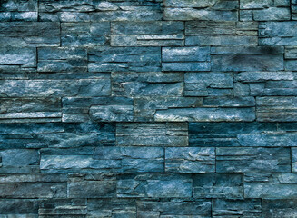 Dark blue bricks wall for abstract brick background and bricks texture.