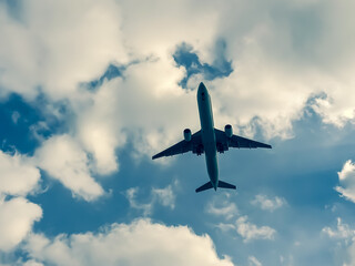 Fototapeta na wymiar Airplane in the Sky
