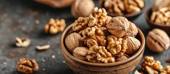 Doctor nutritionist consultations often involve showcasing walnut kernels, providing dietary counseling, explaining their health benefits and effects on the body. - obrazy, fototapety, plakaty