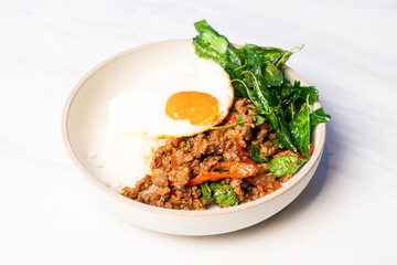  Stir fried Thai basil with wagyu beef and fried egg