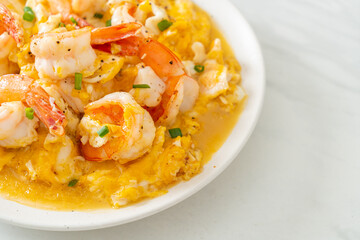 creamy omelet with shrimps or scrambled eggs and shrimps