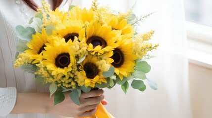Bursting with sunny radiance, a sunflower-themed wedding bouquet captures the warmth and joy of a wedding celebration, embodying the cheerful spirit and natural elegance of this vibrant flower.