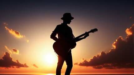 Silhouette of a Guitarist Playing at Sunset with Beautiful Orange Sky and Clouds in the Background