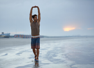 Health, stretching and beach with man, fitness and vacation with summer break and morning. Travel, ocean and person with holiday or seaside with with exercise, peaceful and water with wellness or sky - Powered by Adobe