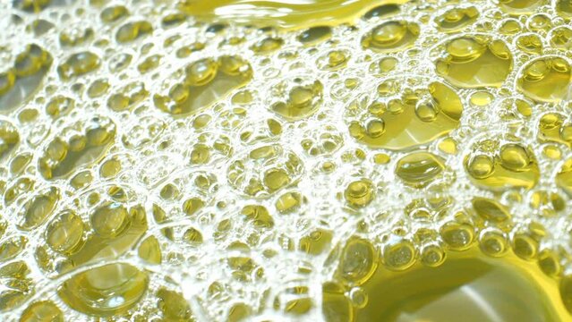 Observe the fascinating phenomenon of urine's molecular composition causing foaming, an indicator of excess proteins, possibly due to glomerular filtration issues. Urine and urology concept. 4K.
