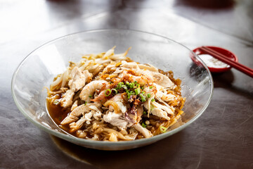 Ipoh popular dry shredded chicken and prawn hor fun noodle served with chili sauce dipping.