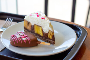 Chocolate Banoffee Pie on white plate.