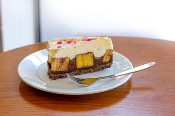 Chocolate Banoffee Pie on white plate.