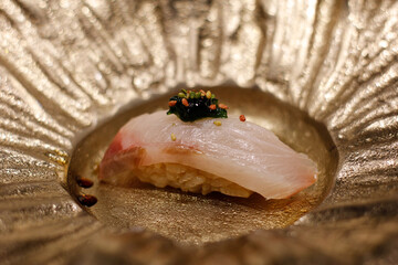 Close up, Shima aji sushi on black plate, Food in Japan