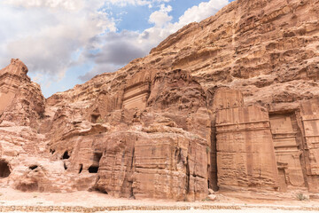 Majestic facades of the tombs carved by Nabatean craftsmen into the rock in the Nabatean Kingdom of Petra in the Wadi Musa city in Jordan