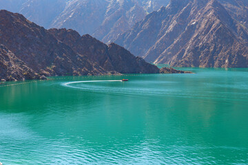 beautiful landscape view of Hatta dam lake and Hajar mountain in the Dubai, United Arab Emirates