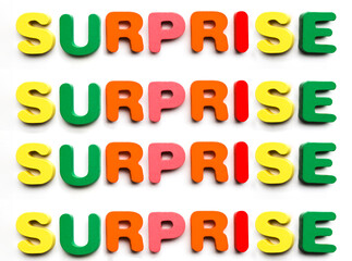 Word made from colorful wooden letters - SURPRISE isolated on white background. word art with "surprize " text. SURPRIZE.  Prize, word concept banner. Winner achievement celebration poster. Lettering