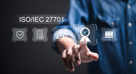 ISO/IEC 27701 concept, businessman touch virtual screen of ISO/IEC 27701 icon for privacy...