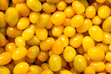 Abundance of fresh yellow cherry tomatoes