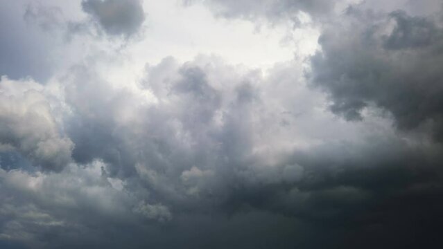 Time lapse storm is coming. Dramatic rain clouds approach the hill