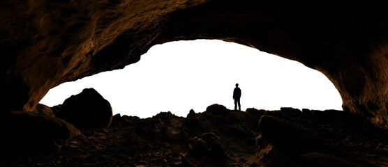 Adventure Man Hiker standing in Rocky Cave on top of a Mountain, Looking out. PNG Cutout. 3d Rendering