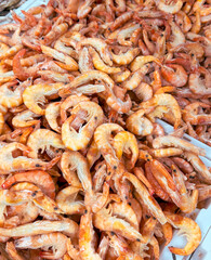 Red shrimp on a shelf in a market