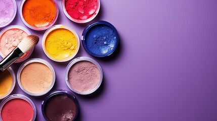 professional colorful makeup tools. makeup products on a lilac background