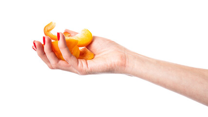 Orange sweet bell pepper slices in hand isolated on a white background. Woman holding bulgarian pepper. Healthy food and ingredients concept