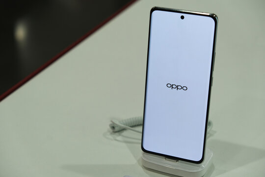 Shanghai,China-Jan.20th 2024: Oppo smartphone product demo in store. Logo on screen. Chinese mobile phone company