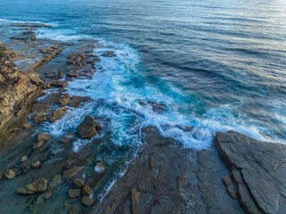 Sunrise over the ocean and rocky Inlet