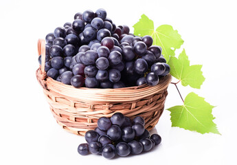 Black or purple grapes in wooden bowl