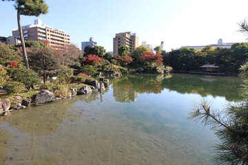 Ingetsu Pond and autumn leaves in Shosei-en Garden, Kyoto, Japan