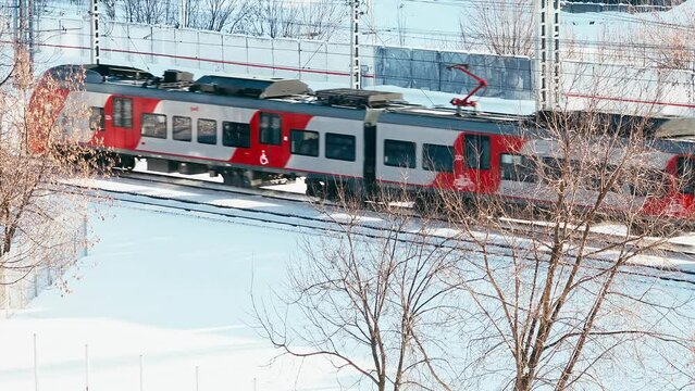trains moving on rails in both directions in winter time