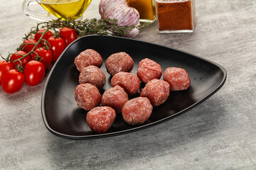 Uncooked raw beef meatball minced