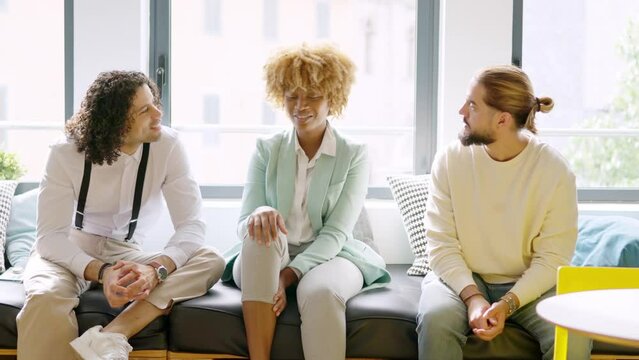 Coworkers talking distracted during a work break
