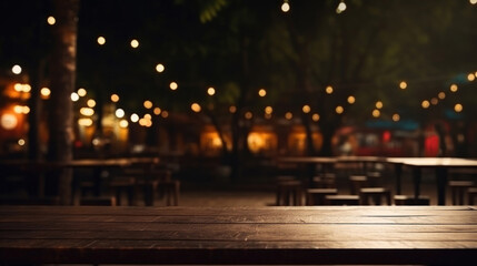 An inviting outdoor seating area at dusk, warmly lit with string lights, awaits patrons with its empty wooden tables and cozy ambiance.